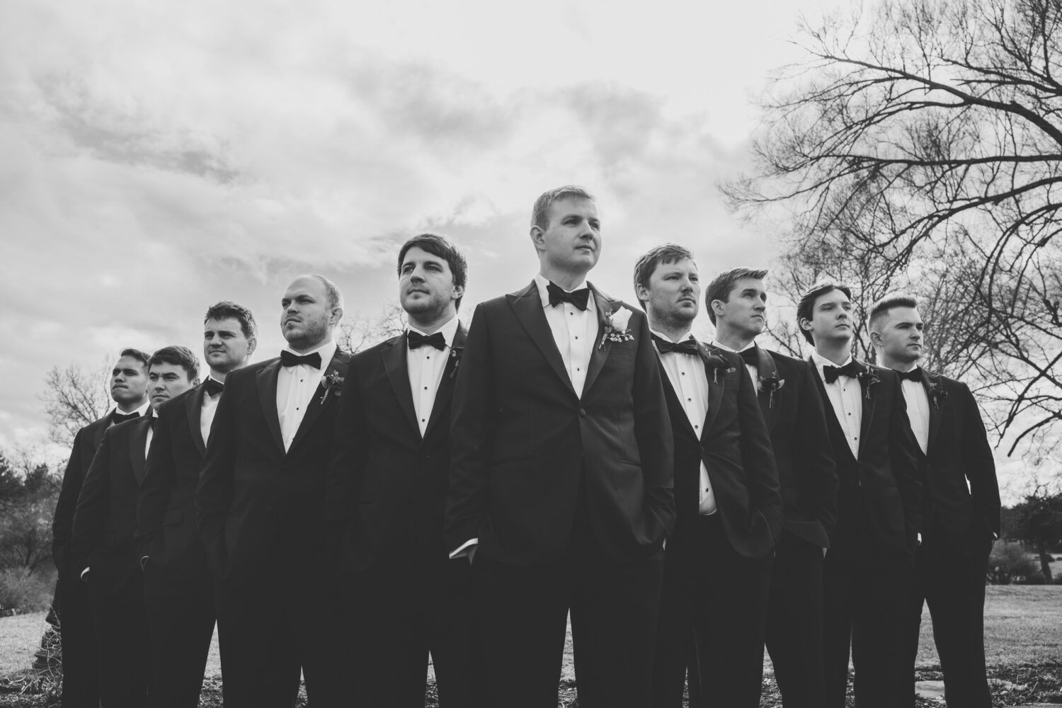 stoic portrait of groomsmen wedding party