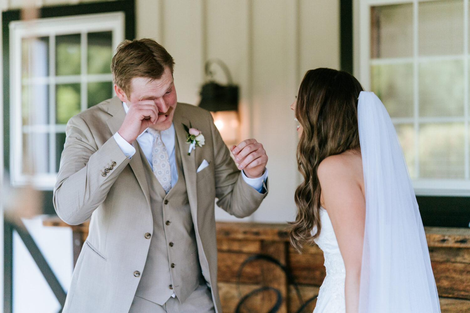groom crying in front of his bride on their loudoun county wedding day