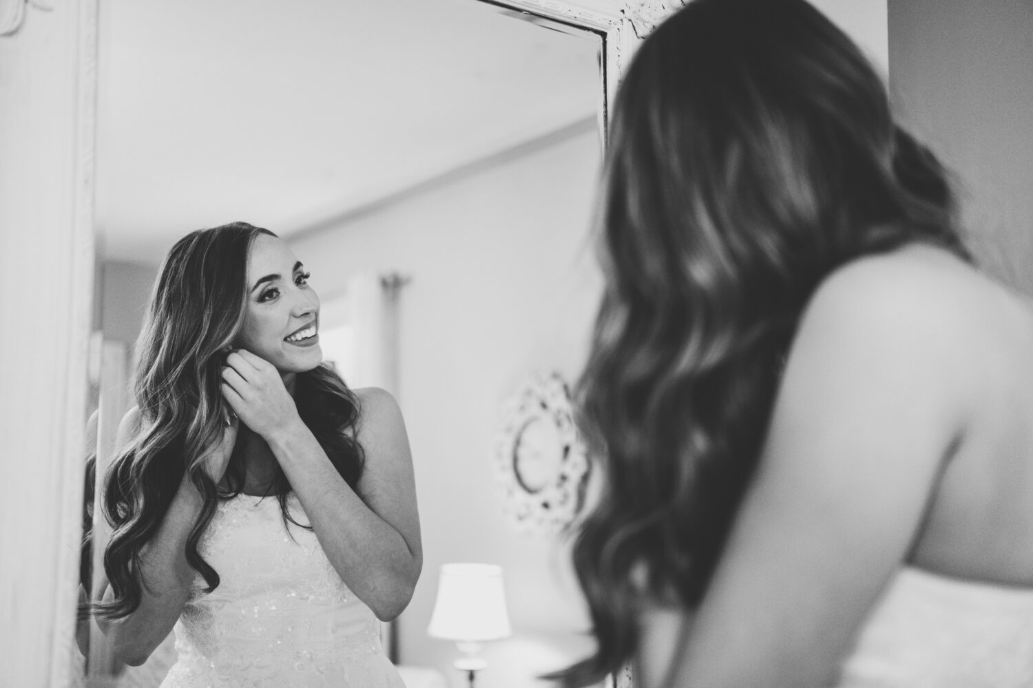 bride getting ready in her shadow creek wedding suite