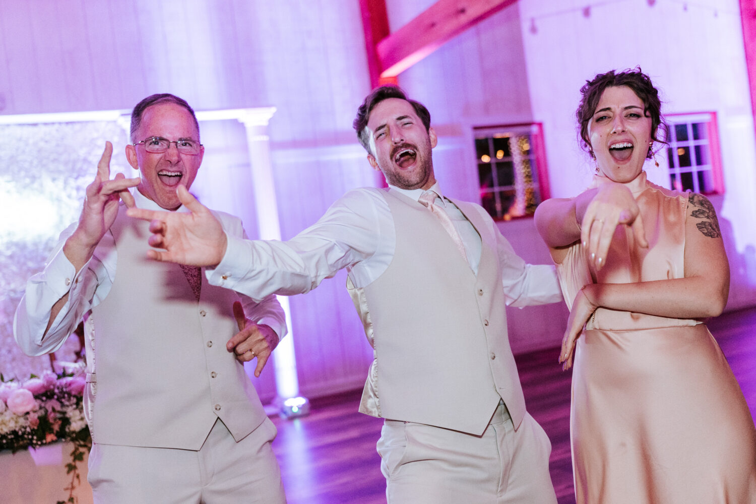 wedding guests having fun on the dance floor