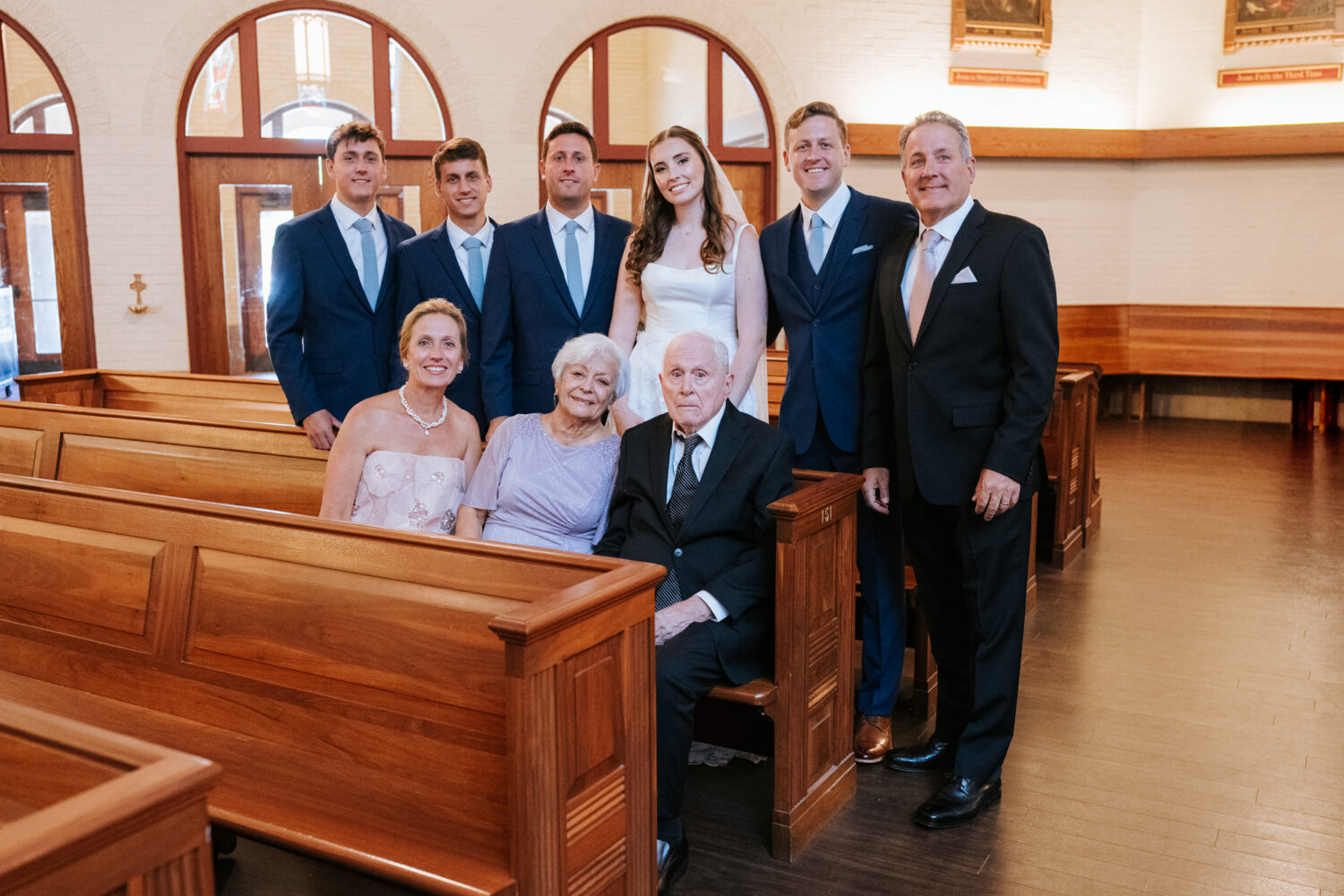 family portrait after a church wedding ceremony