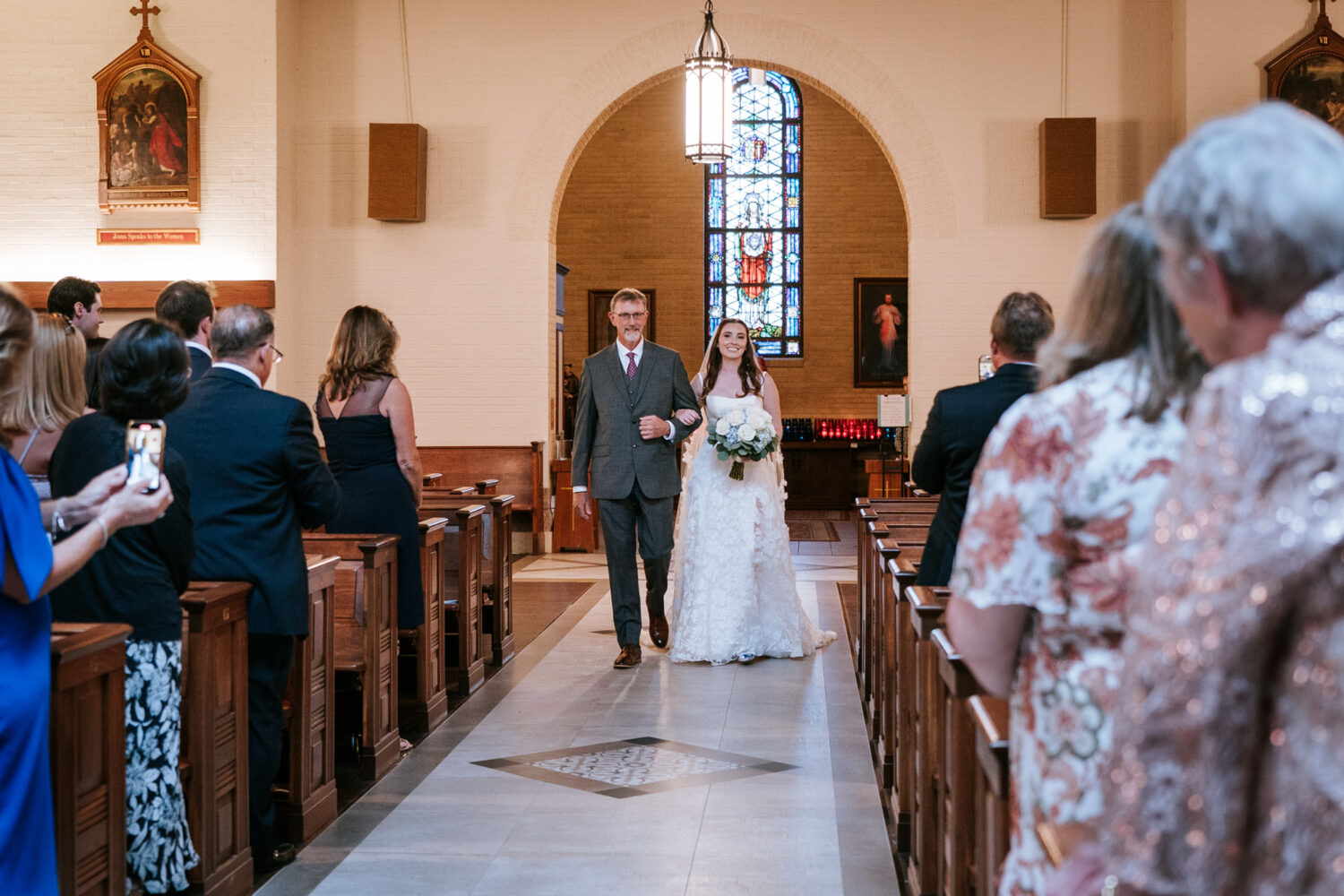 bride walking down the aisle during her northern virginia wedding day