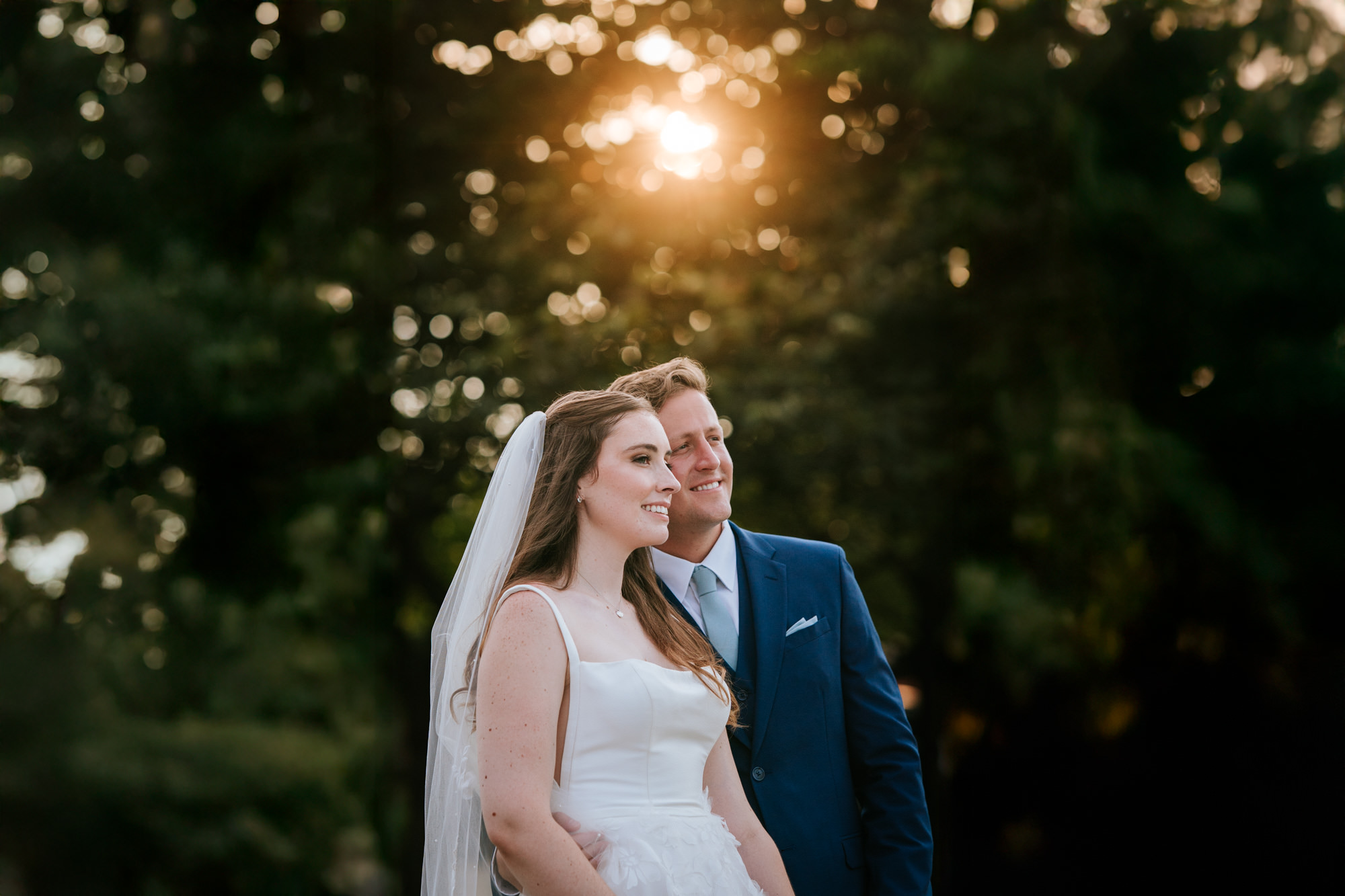 bride and groom smiling together on their lansdowne resort wedding day
