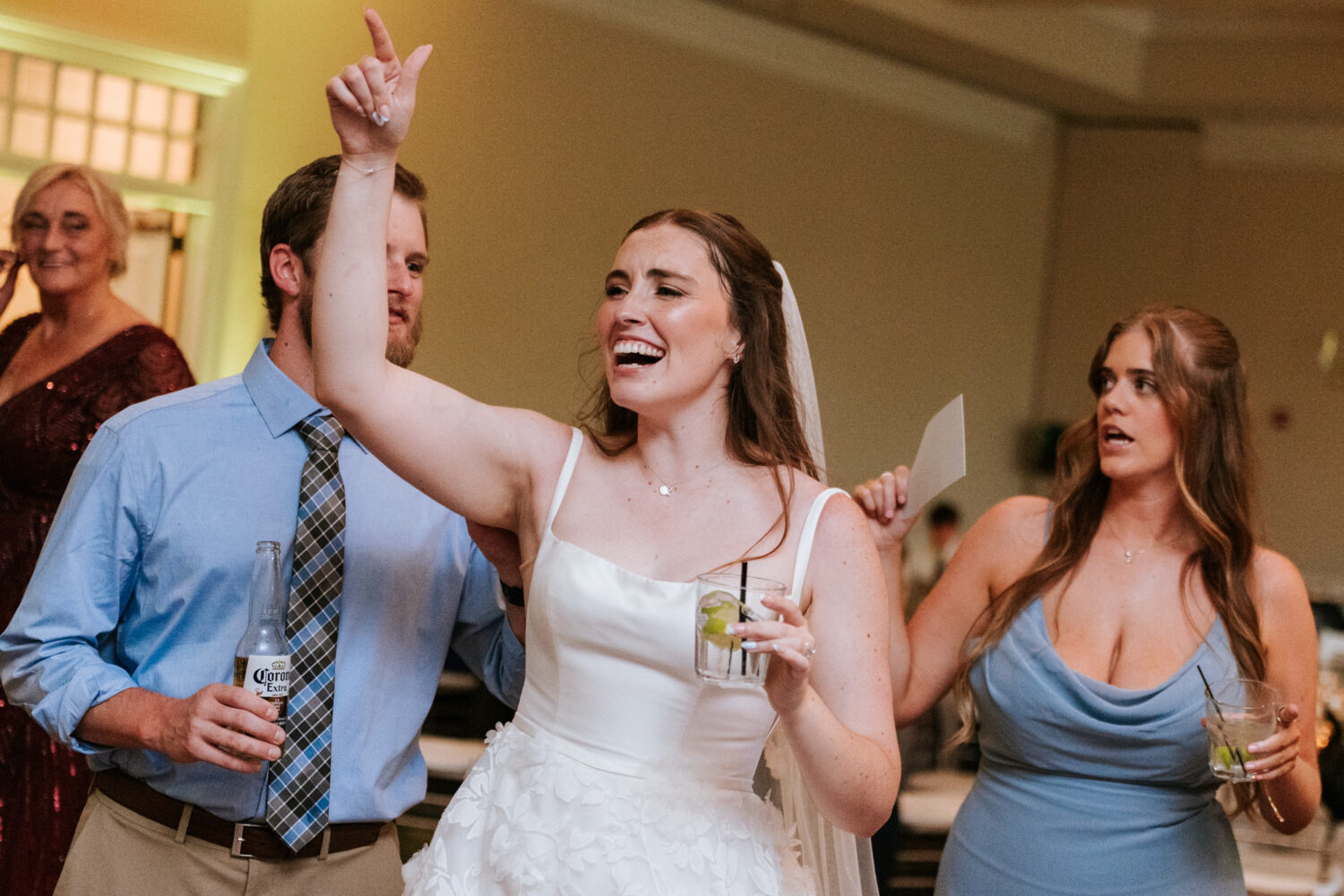 bride having fun during her lansdowne resort wedding reception
