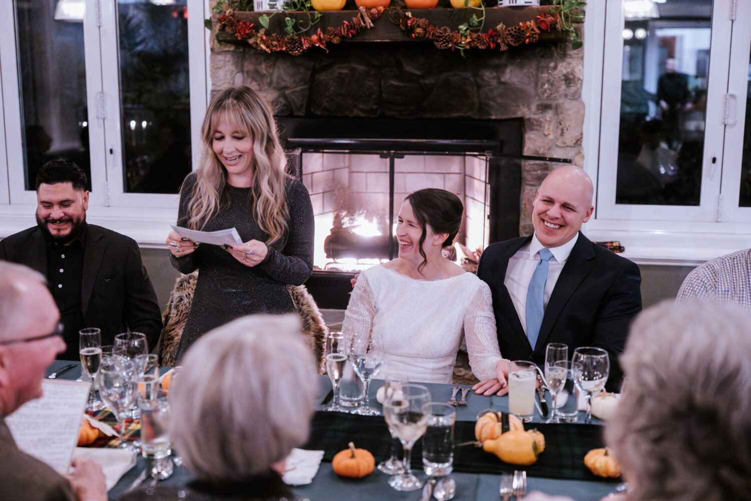 Emotional reception toasts given during intimate wedding dinner