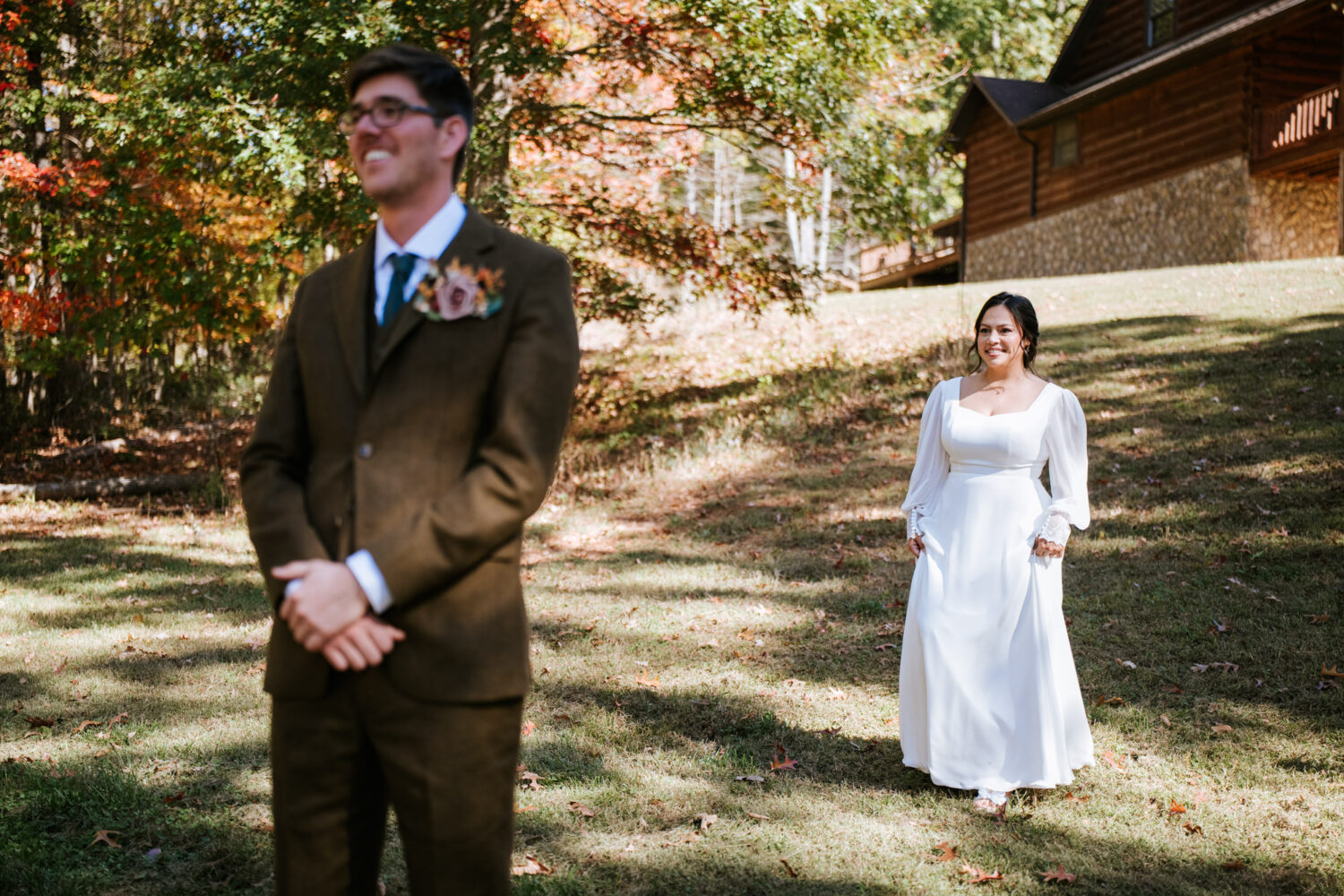 Bride approaching groom for their first look in the woods at Shenandoah Woods wedding
