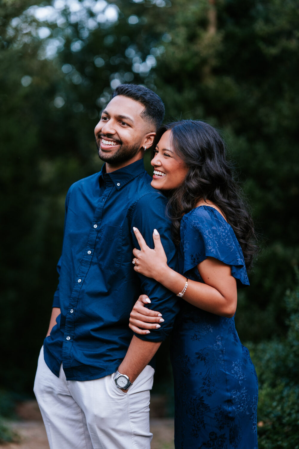 Smiling couple after a proposal at Oatlands Historic House & Gardens in Leesburg, VA, sharing a joyful moment in the gardens.