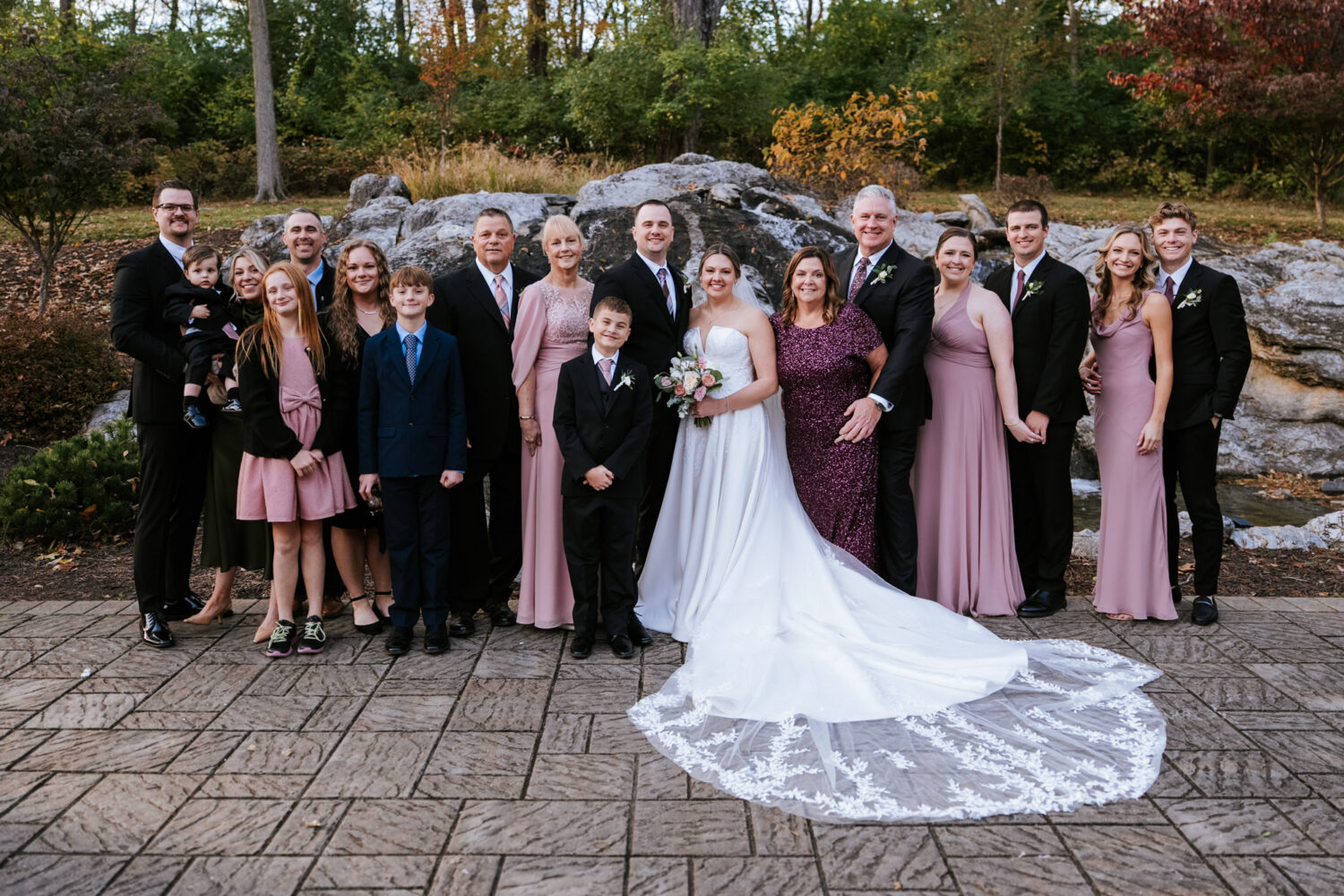 Large family portrait taken after the ceremony