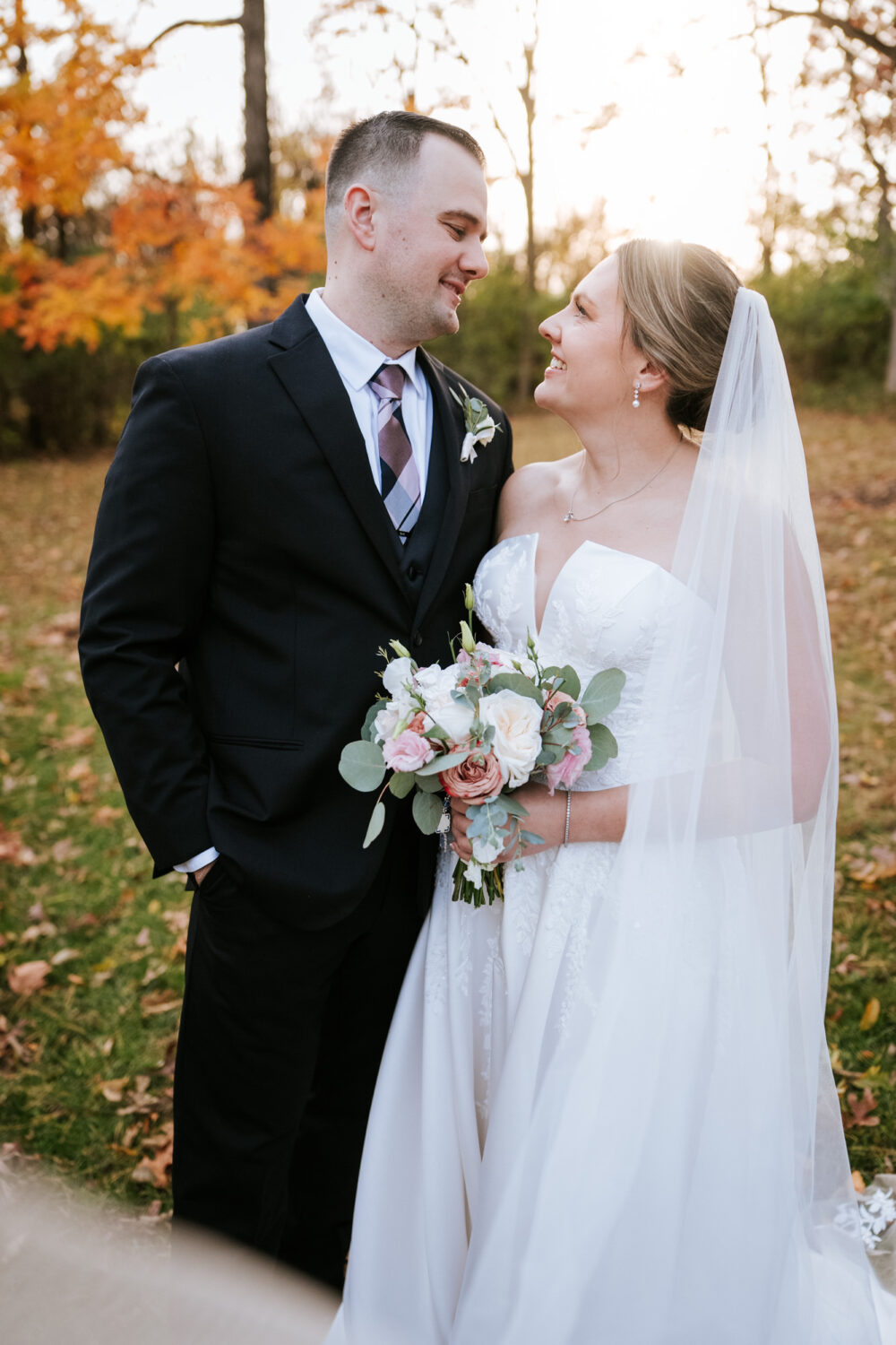 Couple sharing a moment during fall portraits at Rosemont Springs
