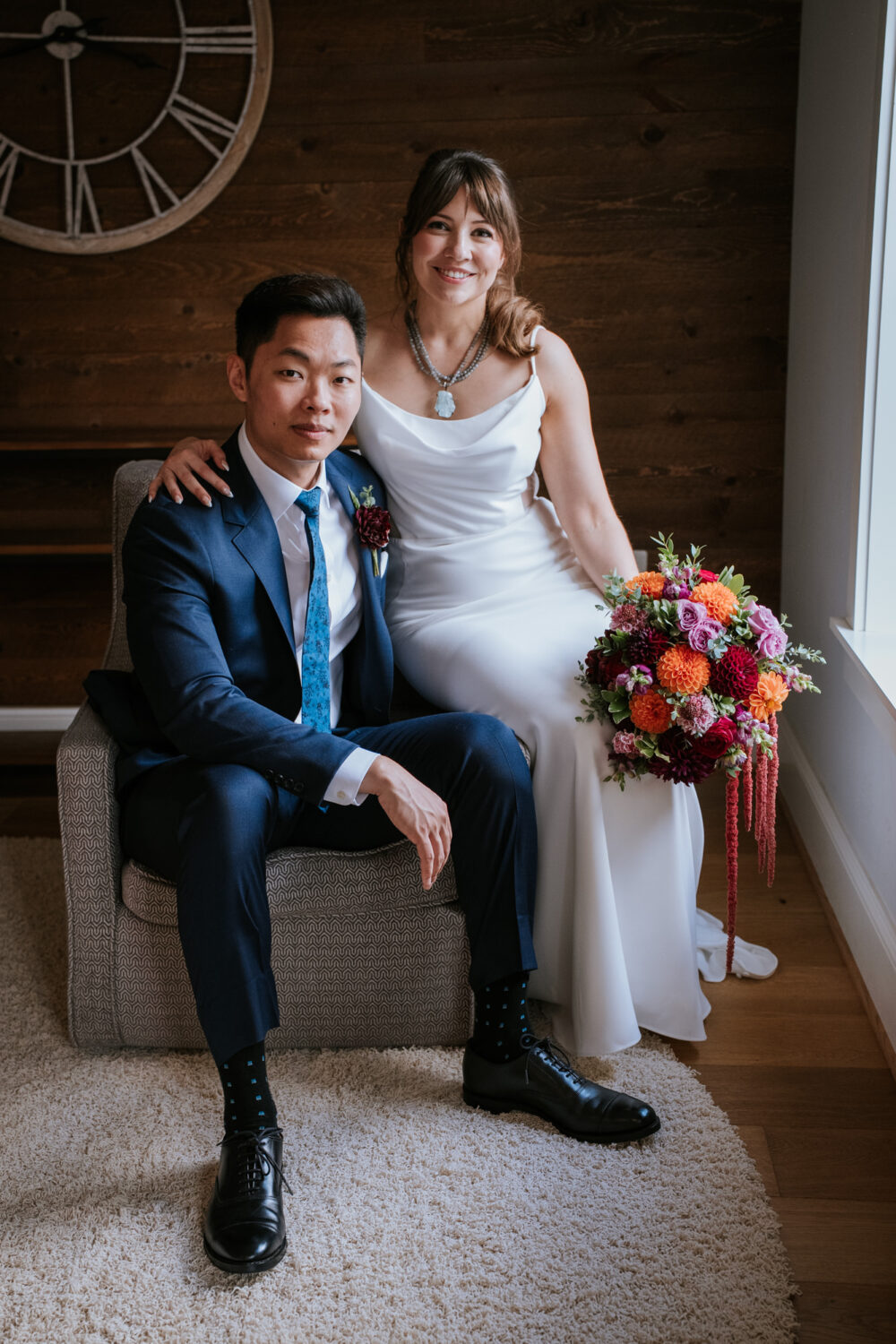 Bride and groom portrait indoors at their Willow Brook Barn wedding
