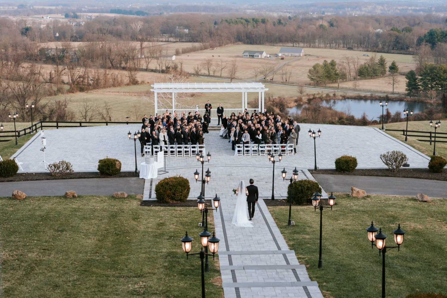 Bride walking down the aisle and toward her wedding ceremony