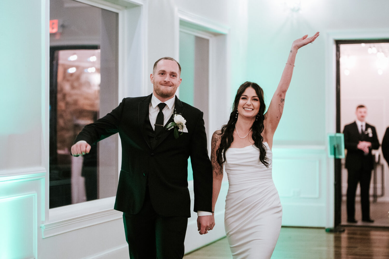 Bride and groom grand entrance at wedding reception